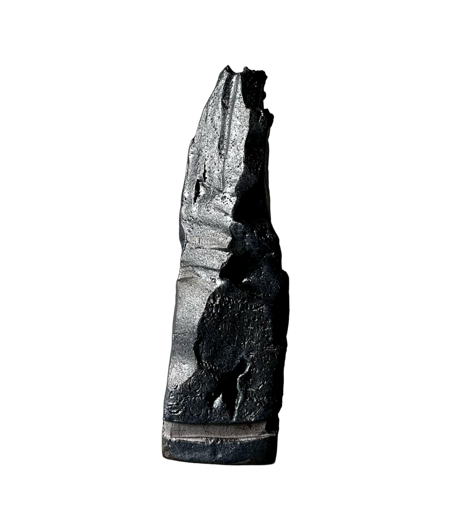 Black stoneware sculpture, Chronolith 03, tall irregular vertical form with incised geometric marks.