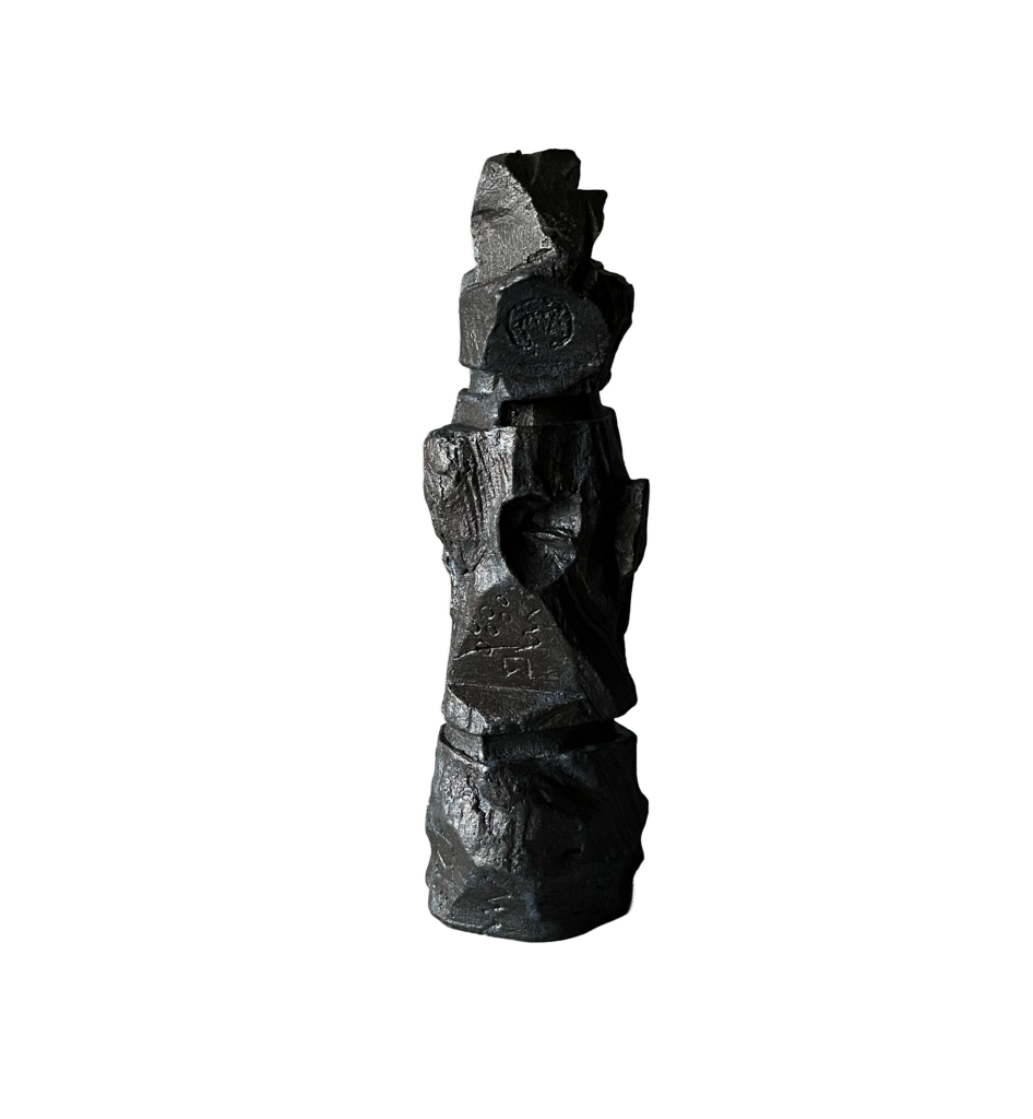 Black stoneware sculpture, Chronolith 07, tall irregular vertical form with incised geometric marks.